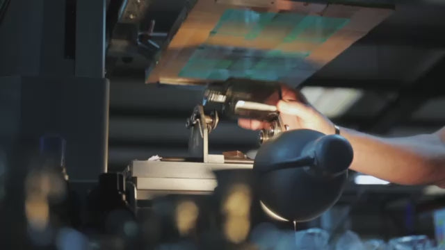 Bottles being printed in factory | True Grace Home fragrance